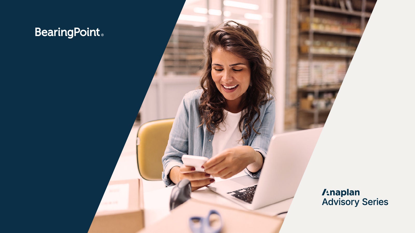 BearingPoint and Anaplan Logos displayed left and right. Image shows a smiling woman seated at a desk using a smartphone, with packages, a laptop, and retail shelving in the background—conveying a modern retail workspace.
