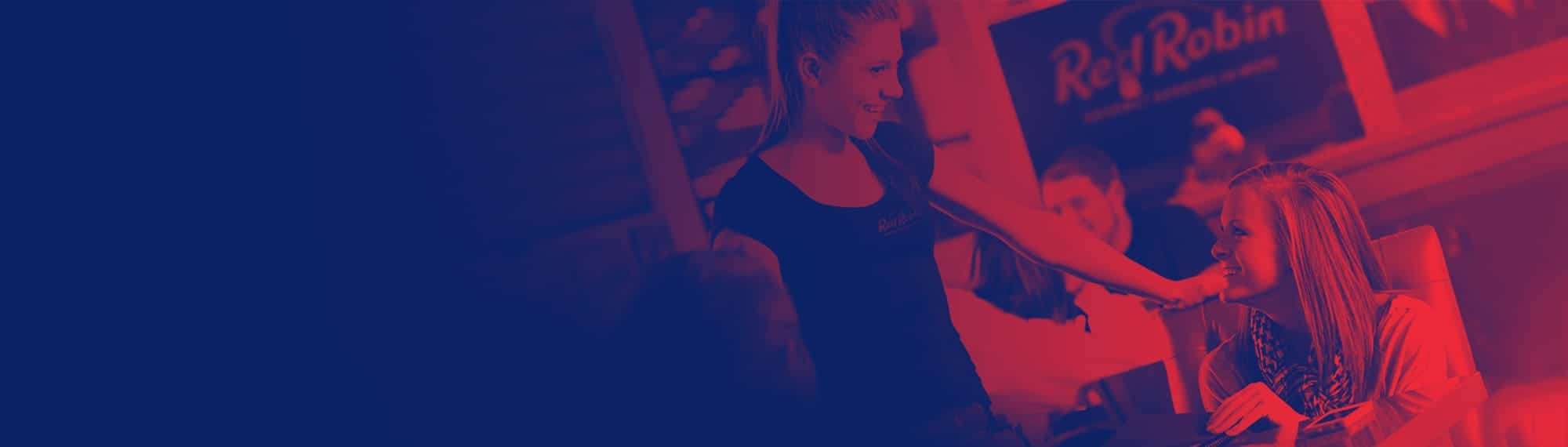 People eating at a Red Robin restaurant