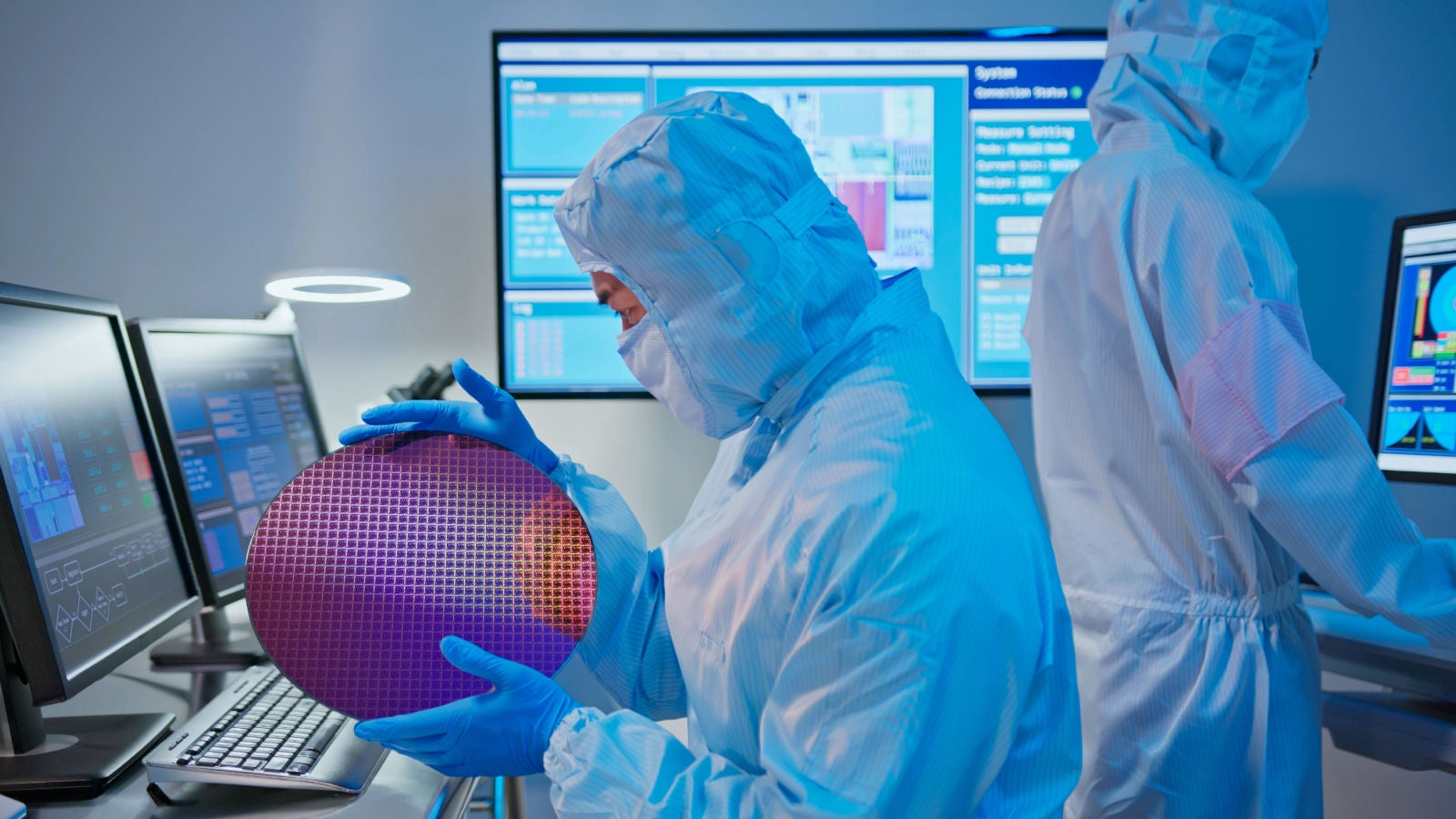 Lab workers running tests