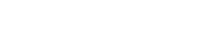 White sandy beach with an empty sunbathing chairs and a large beach umbrella