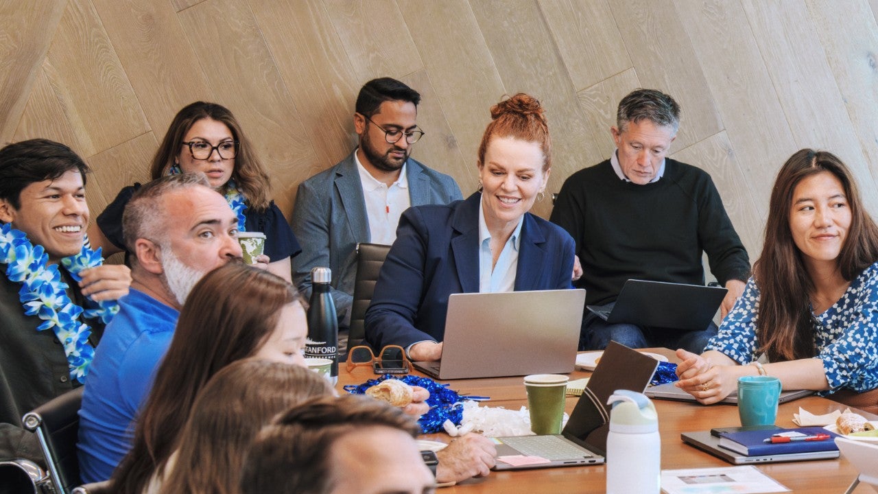 Group of Anaplan employees in a conference room