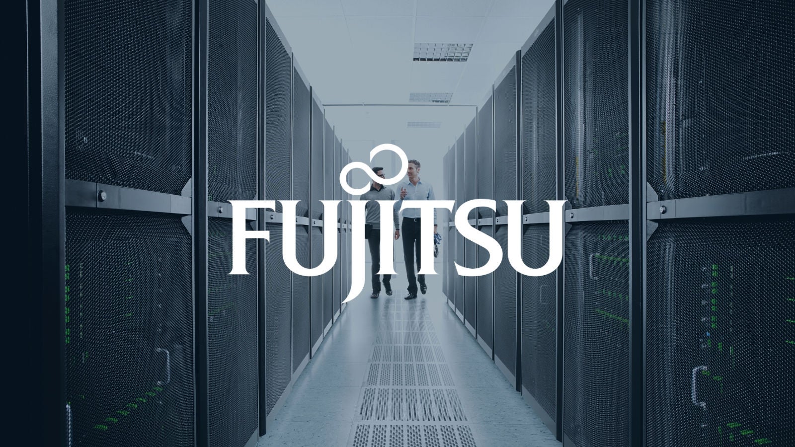 Fujitsu logo on a image of business people walking in a server room