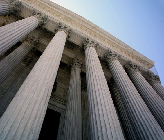 An architectural landmark with its impressive façade and steps.