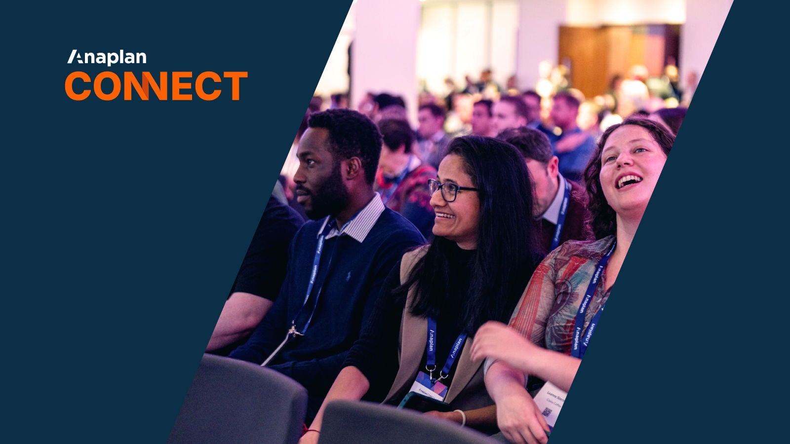 Anaplan Connect Logo over an image of a group of people sitting in an audience of a conference laughing and smiling