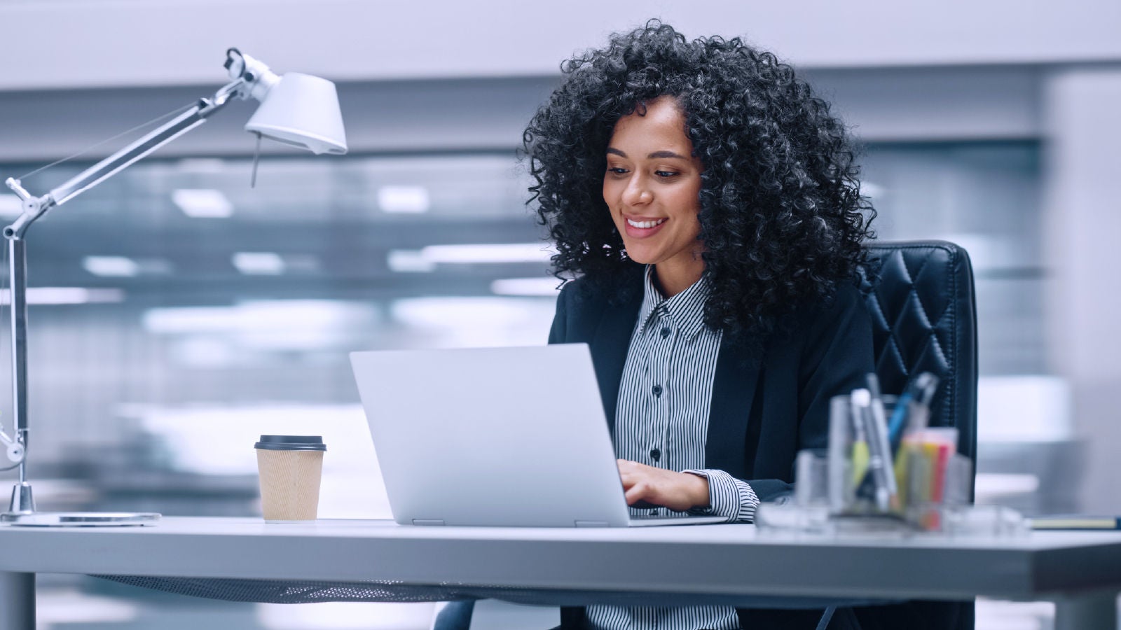 Businesswoman writing reports in the office