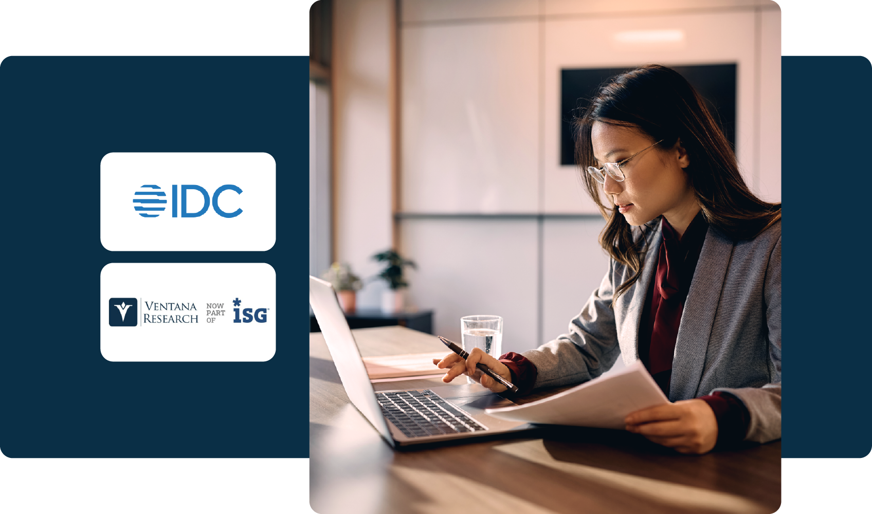 Businesswoman working on a laptop at a desk with documents, next to analyst logos (IDC and Ventana Research).