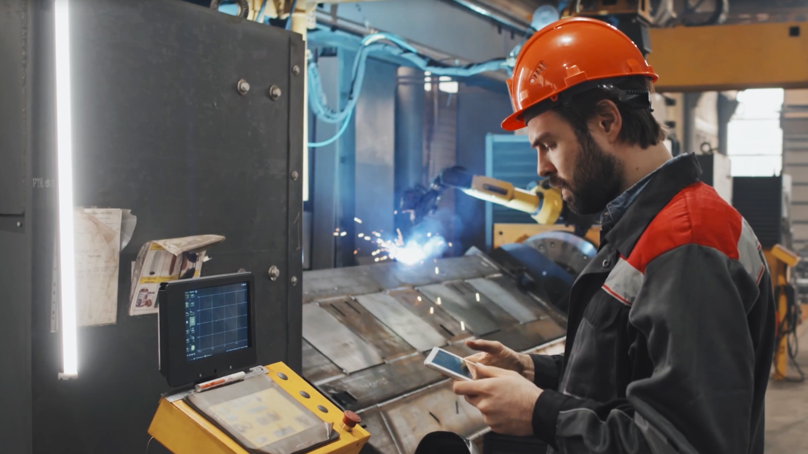 Techtronic ANZ cust story illustrative image 2 Man working in an automotive assembly factory