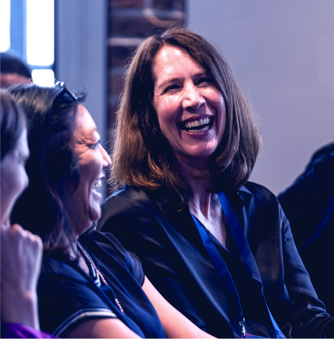 Connect Attendees laughing during session