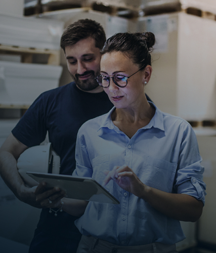 Anaplan blog on getting data AI-ready for merchandise planning teams. The text includes “Getting your data AI-ready: Practical guidance for merchandise planning teams,” with an image of two warehouse workers reviewing data on a tablet.