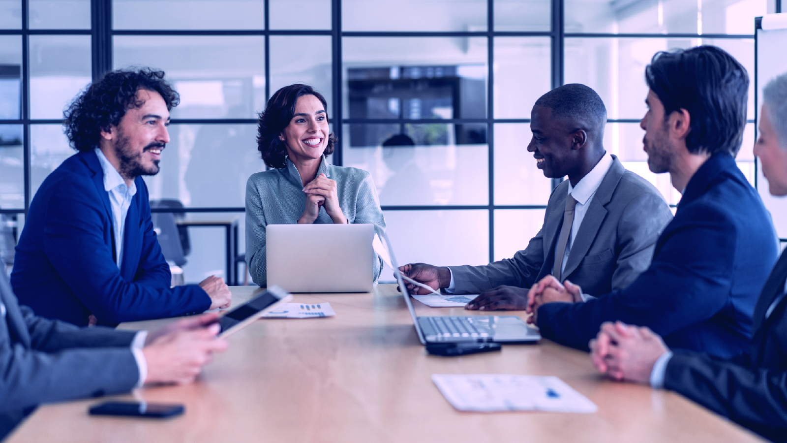 Print A group of team meeting in a conference room