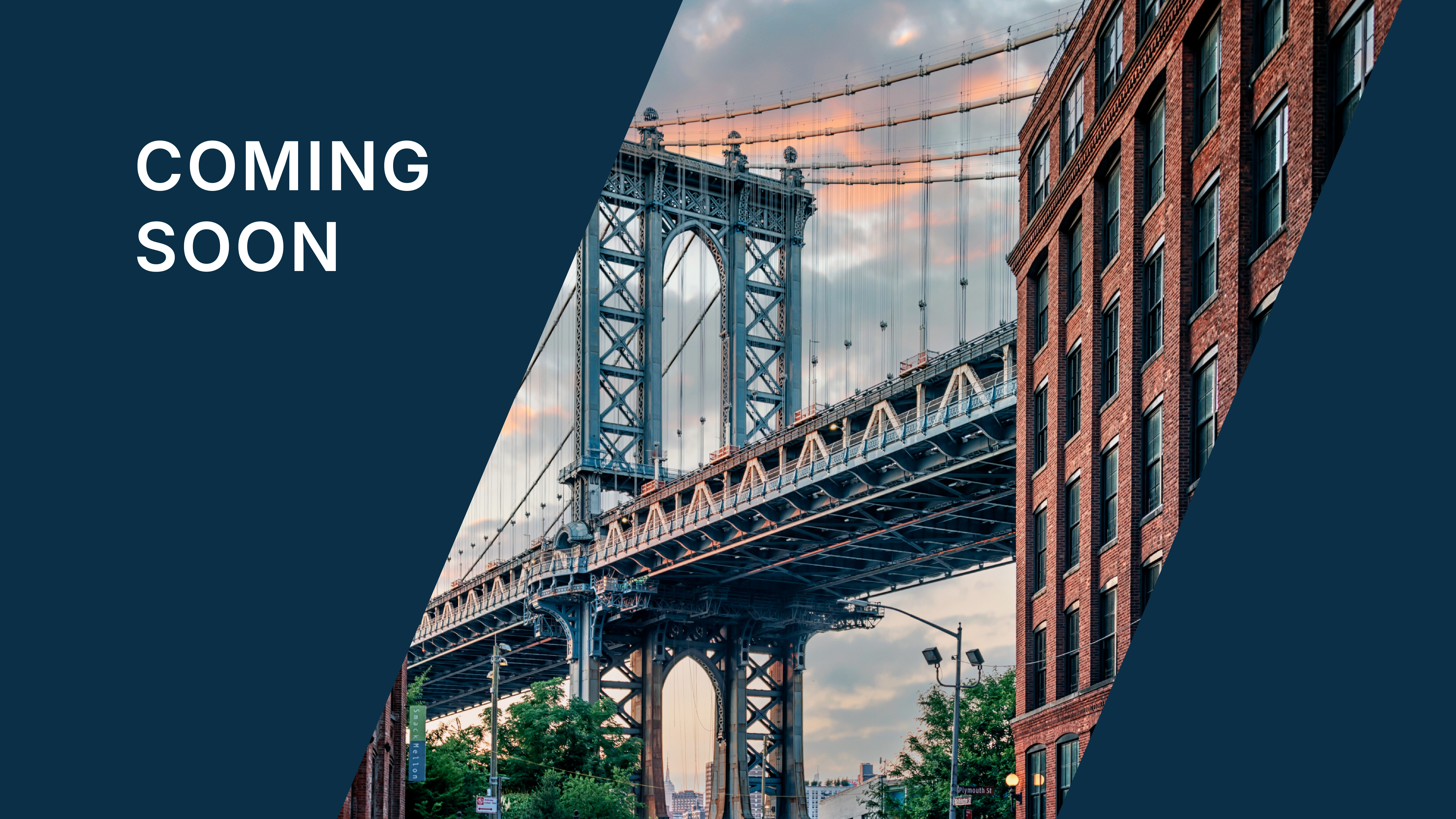 Coming Soon text displayed on a dark blue panel next to a city view of New York City, showing the Manhattan Bridge framed by red brick buildings at sunset.