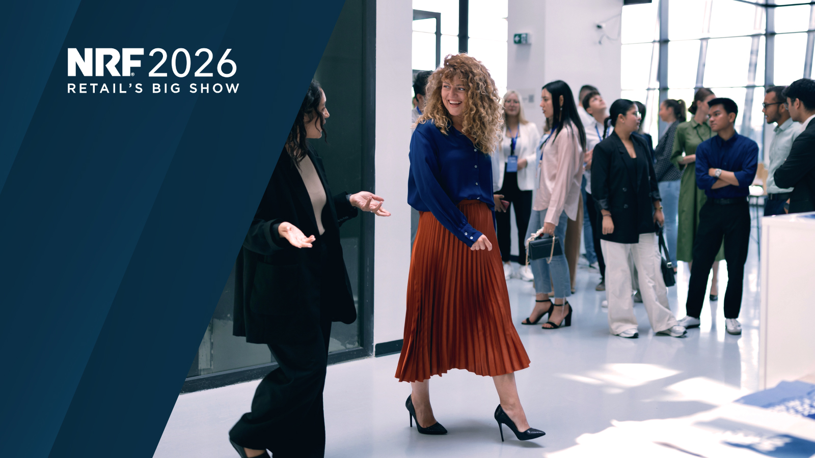 NRF 2026 Retail’s Big Show Logo displayed on the left side over a background image of professionals networking and walking through a modern event venue.
