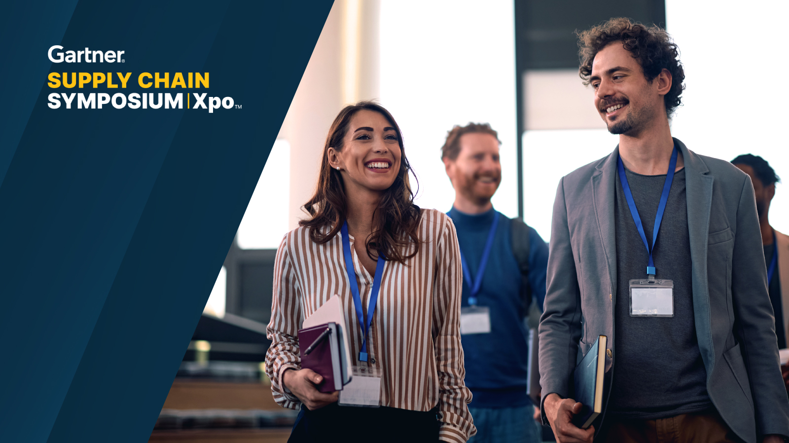 Three smiling attendees walking through a conference venue with event lanyards and notebooks. Dark overlay features the Gartner Supply Chain Symposium/Xpo logo.