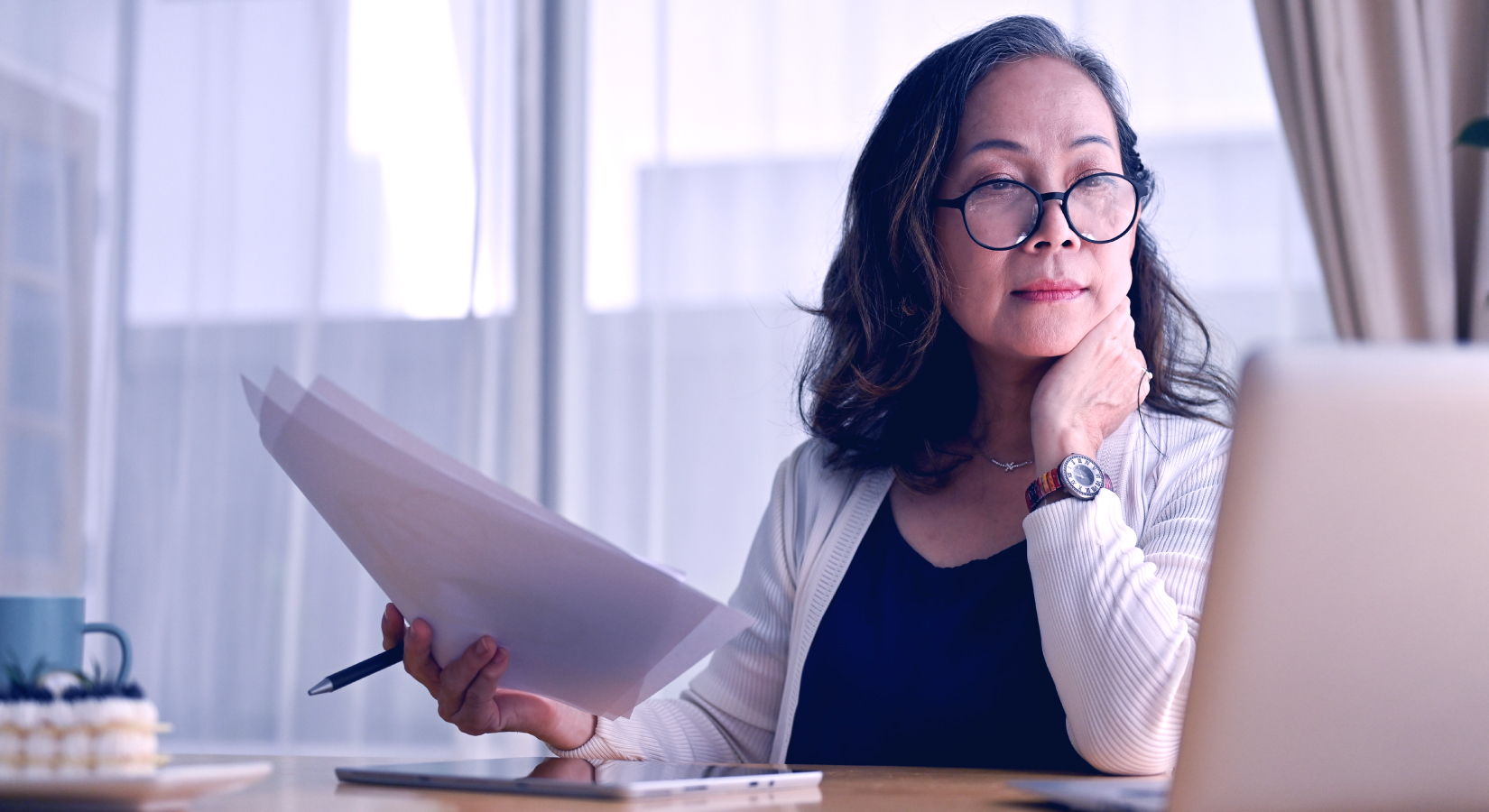 Woman working on a computer program in an office setting