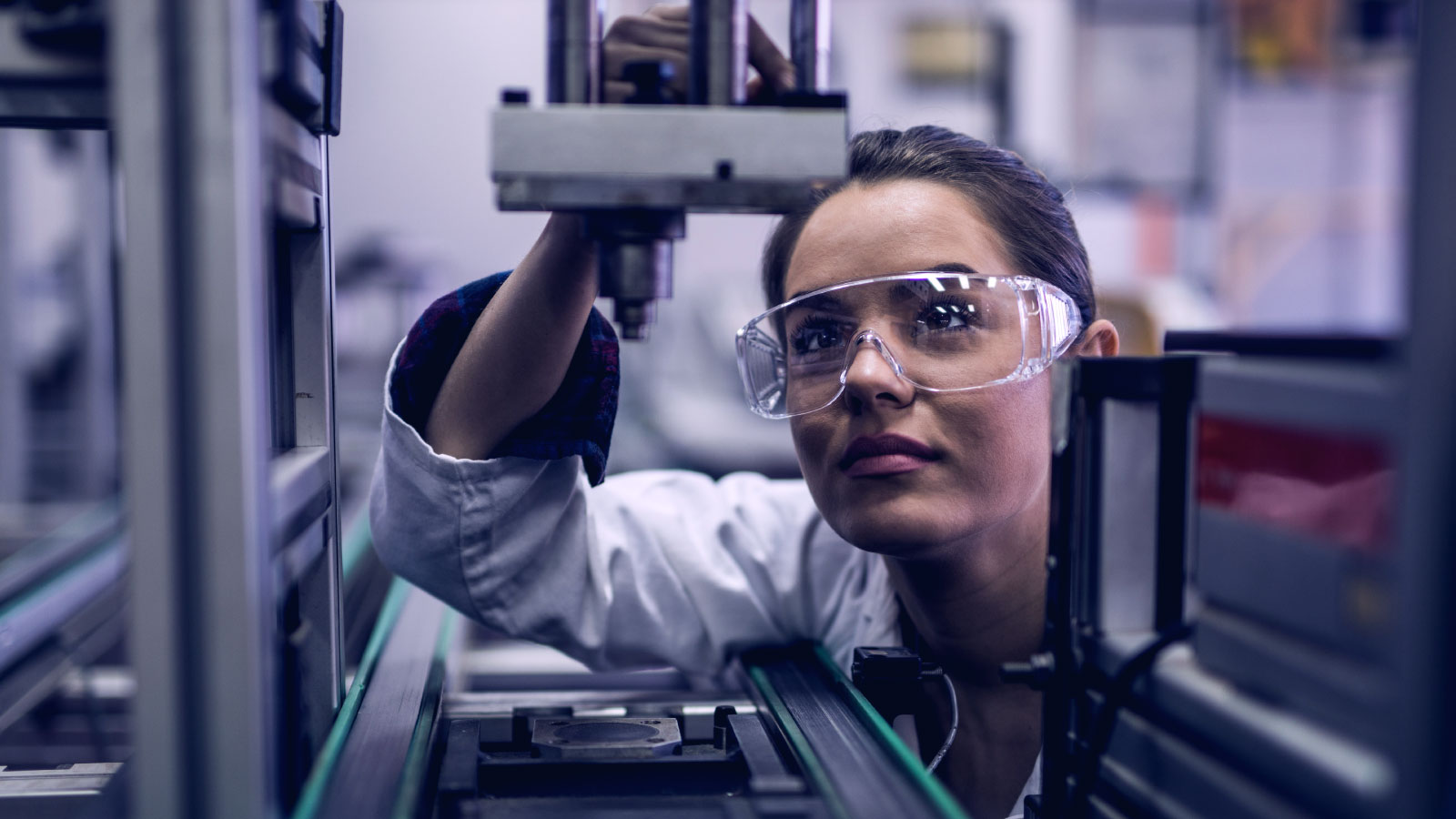 Women scientist setting up equipment