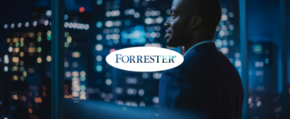 グラフィック:Forrester のロゴが付いたビルのパン ショット