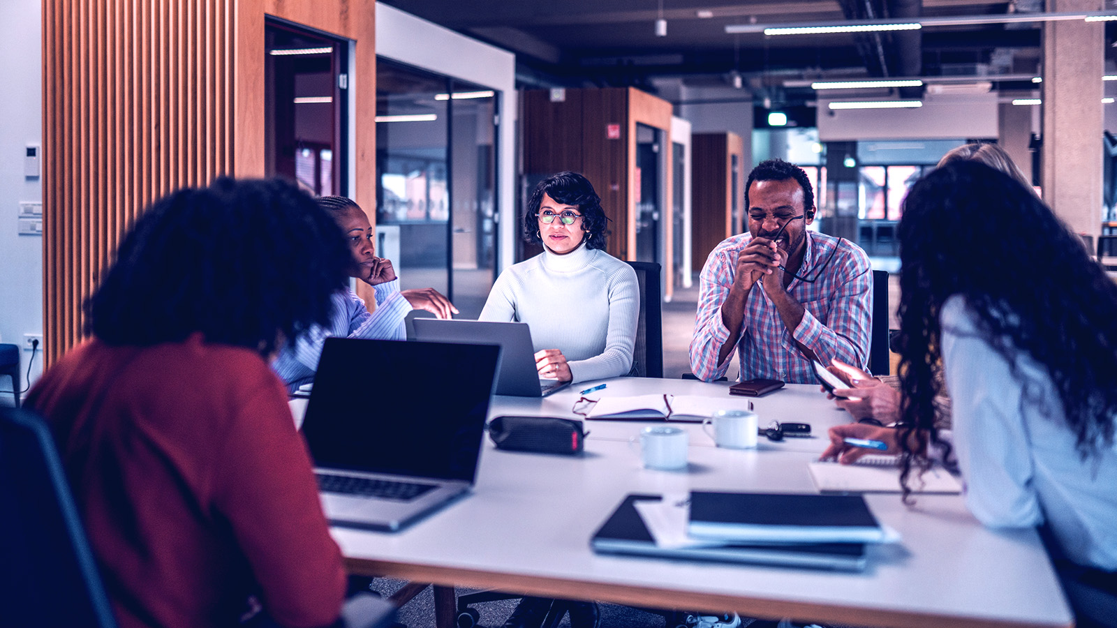 A team in a conference room meeting. 