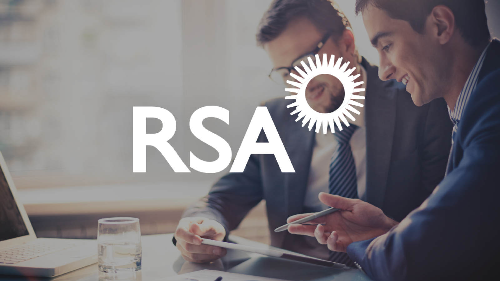 Graphic: RSA logo overlayed on colleagues planning with tablet