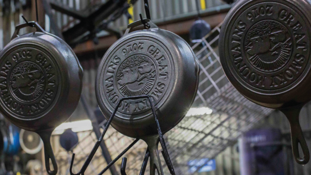 Lodge Cast Iron cookware hanging on display