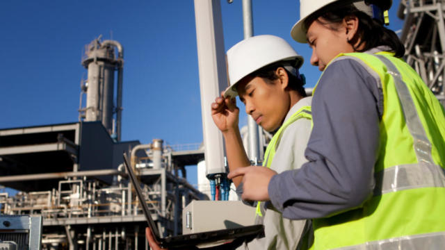 Two coworkers at a construction site