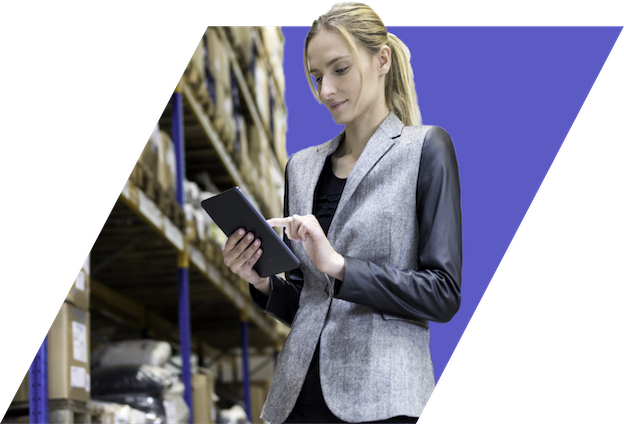 Woman with clipboard inspecting warehouse items