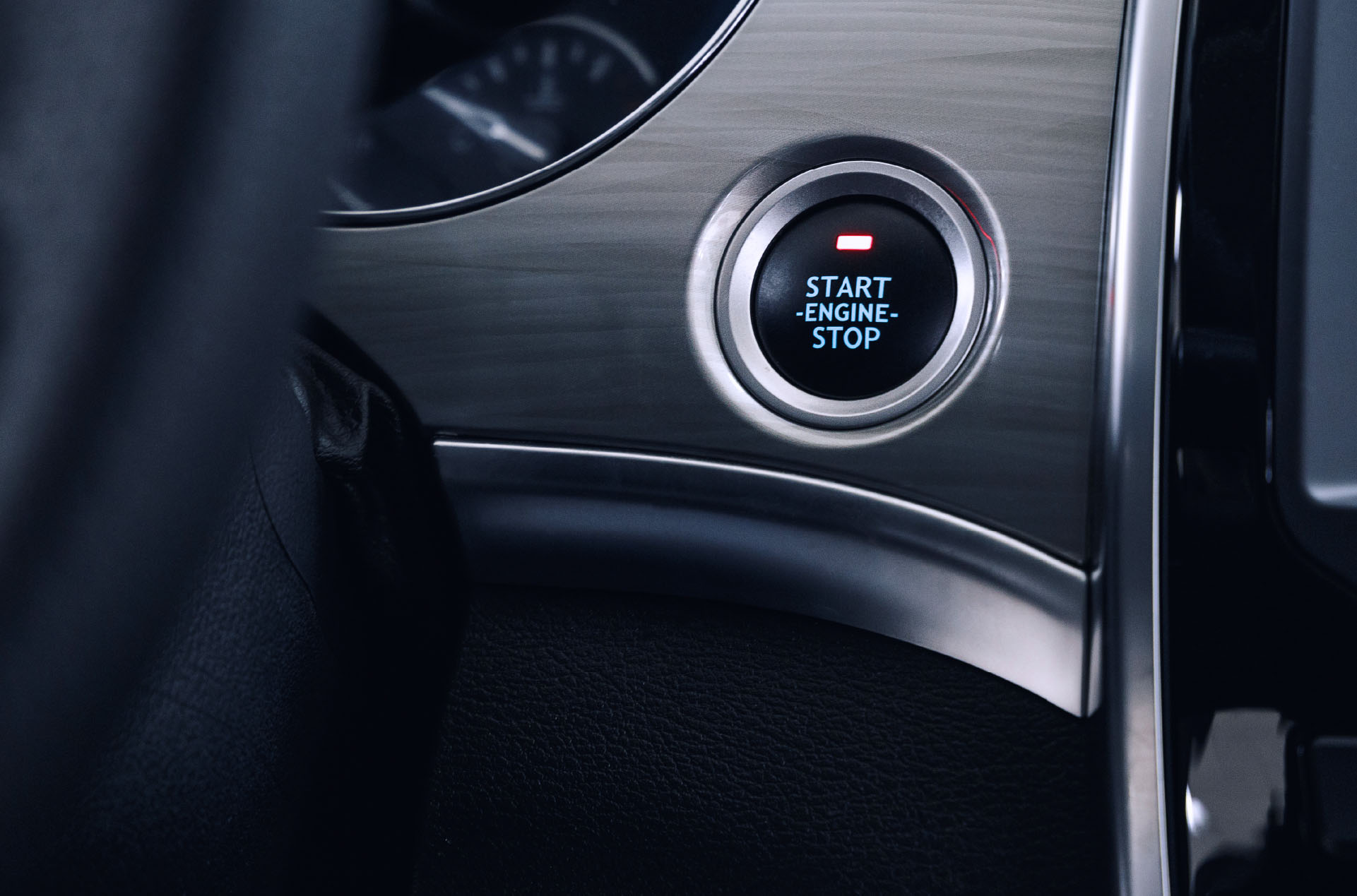 Car start button on dashboard