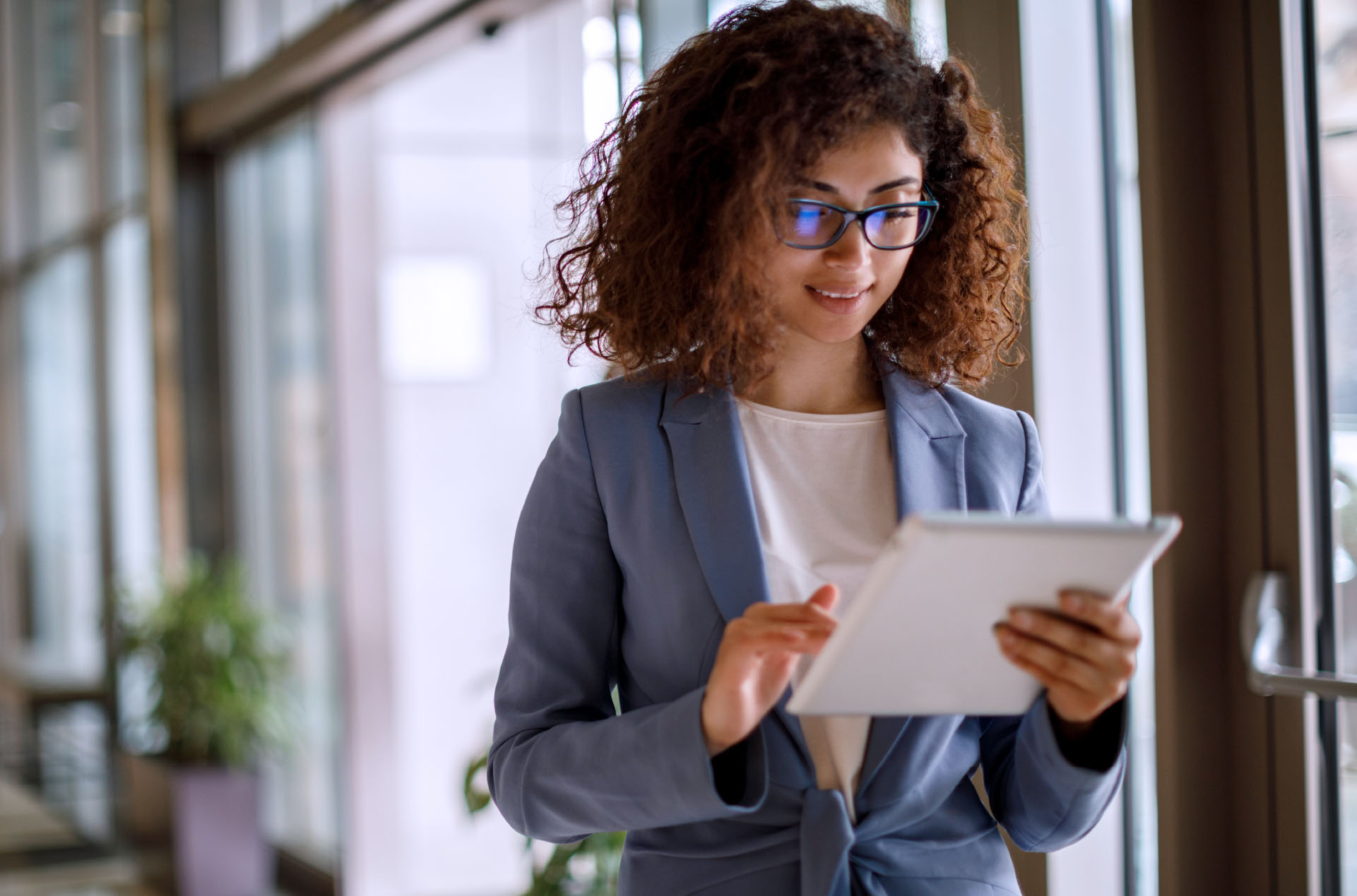 Business woman looking over meeting notes