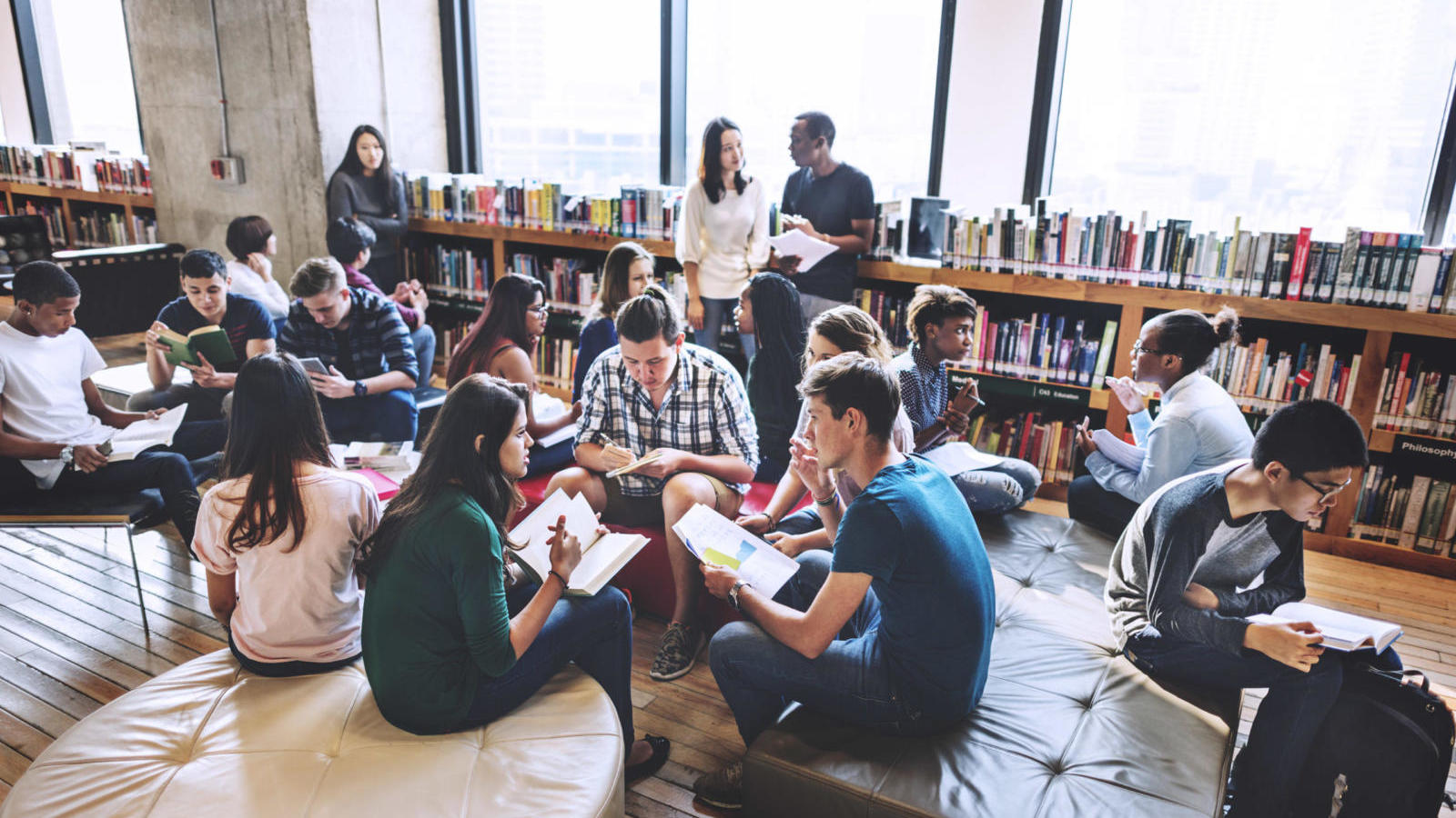 Large group of college students gathered in library