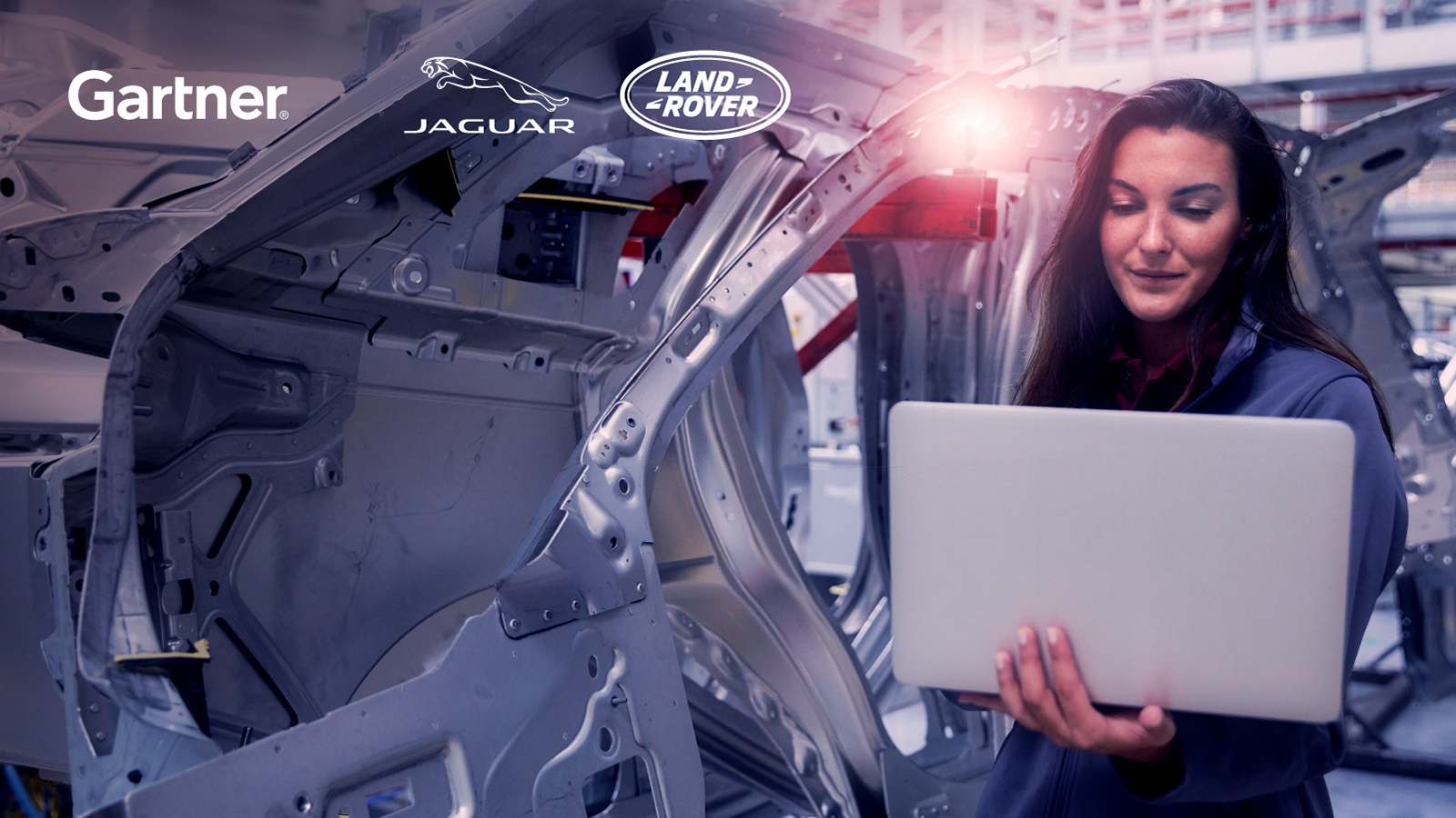 Graphic: Gartner Jaguar Land Rover logos on image of woman working with a laptop in an automotive manufacturing plant