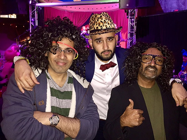 Sheshadri Iyer, Bhavik Vashi, and Fuvas Mohamed pose in costume