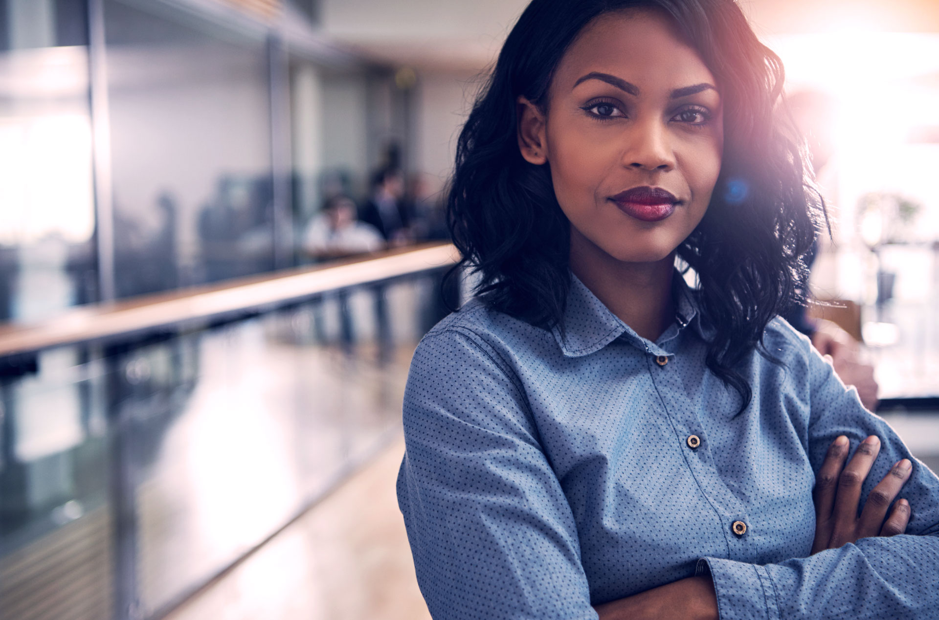 Business woman looking at camera with determination