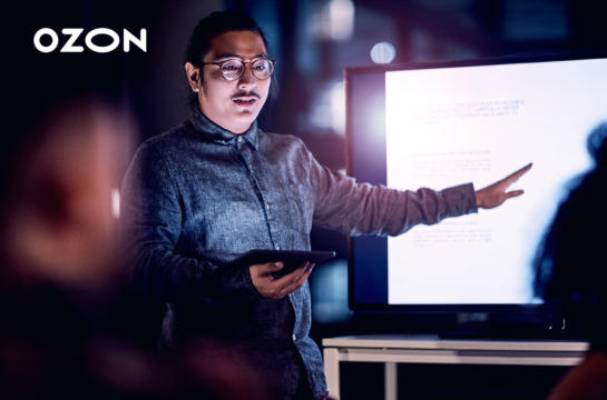 Man giving presentation on large screen