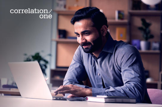Businessman typing on laptop
